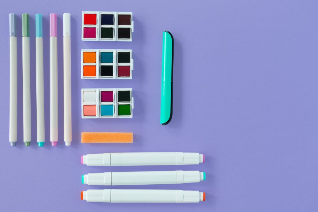 paint-colored-pens-and-portable-scissors