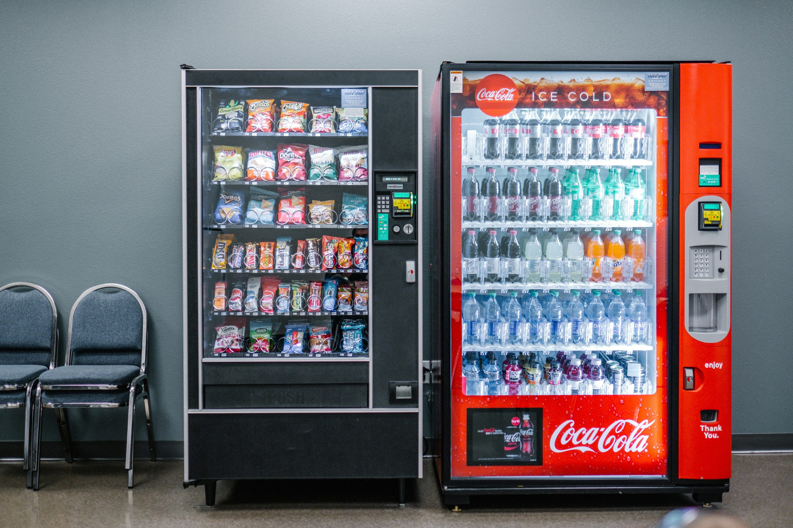 A pair of vending snack machines for sale